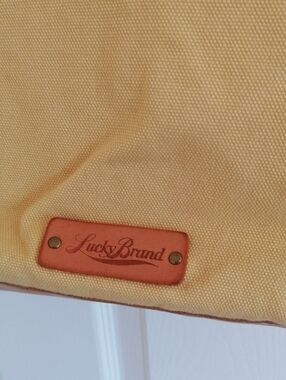Yellow Lucky Brand canvas bag with leather Logo Patch.Great for every day!